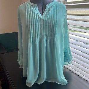 2X dressy or casual, lined in front, jersey knit back. Very soft and feminine.